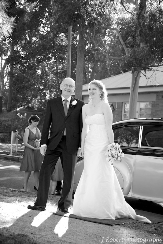 Bride and father getting out of wedding car - weddin gphotography sydney